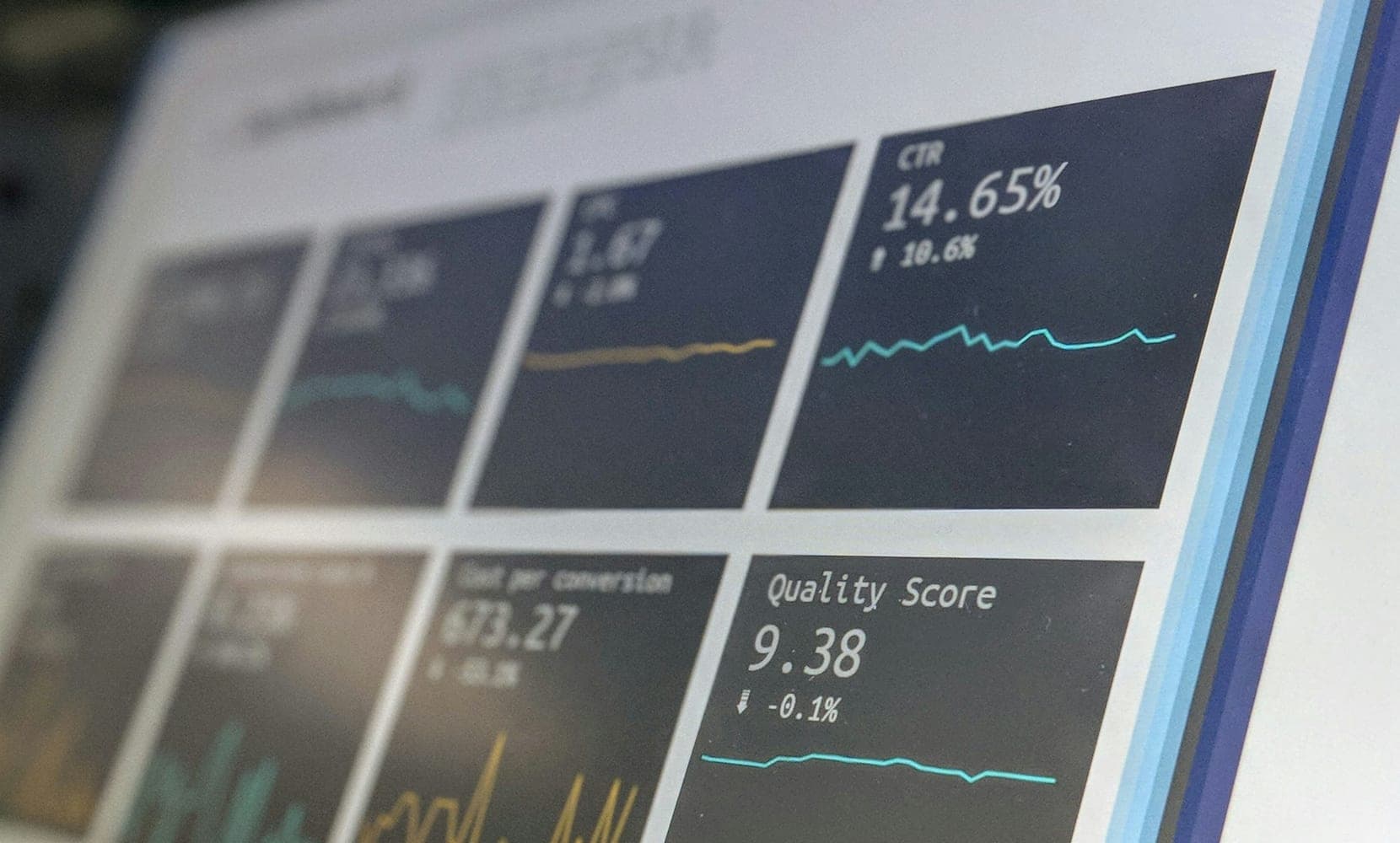 A CPA firm partner reviews a client's bookkeeping dashboard and monthly financial charts on a laptop screen.